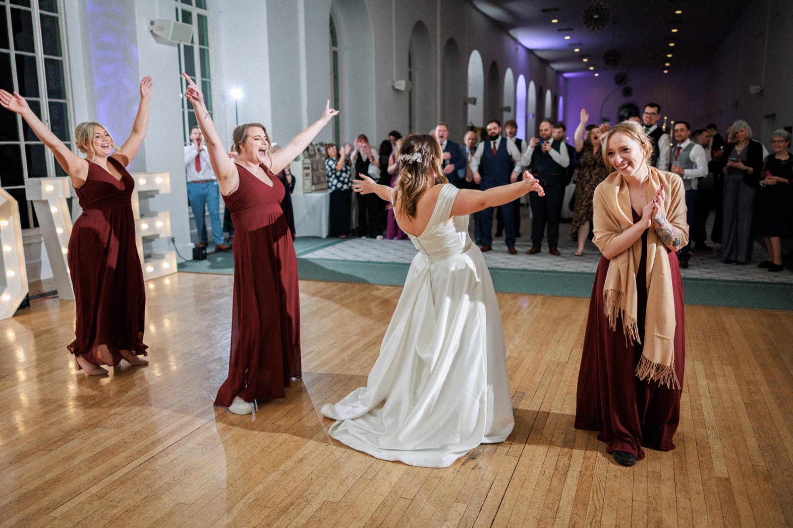 Codey on the dance floor with guests cheering