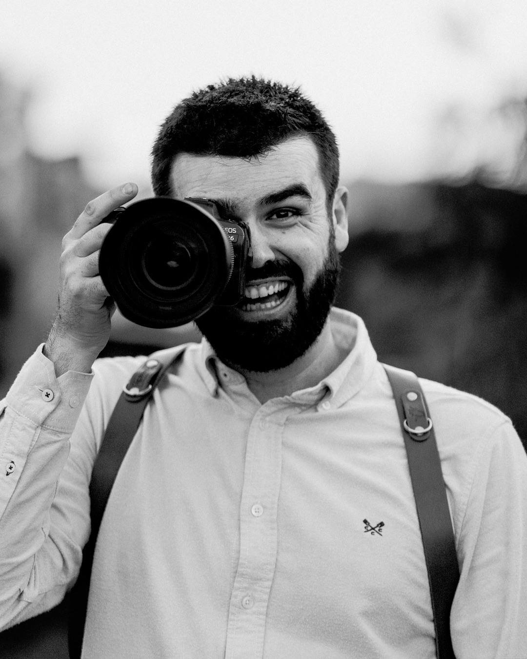 Jack Hughes, grinning behind his camera